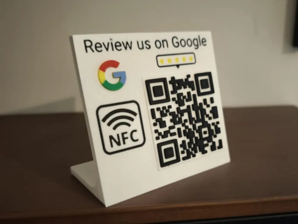 White 3D-printed counter stand with a Google logo, NFC icon and QR code asking customers to leave a review