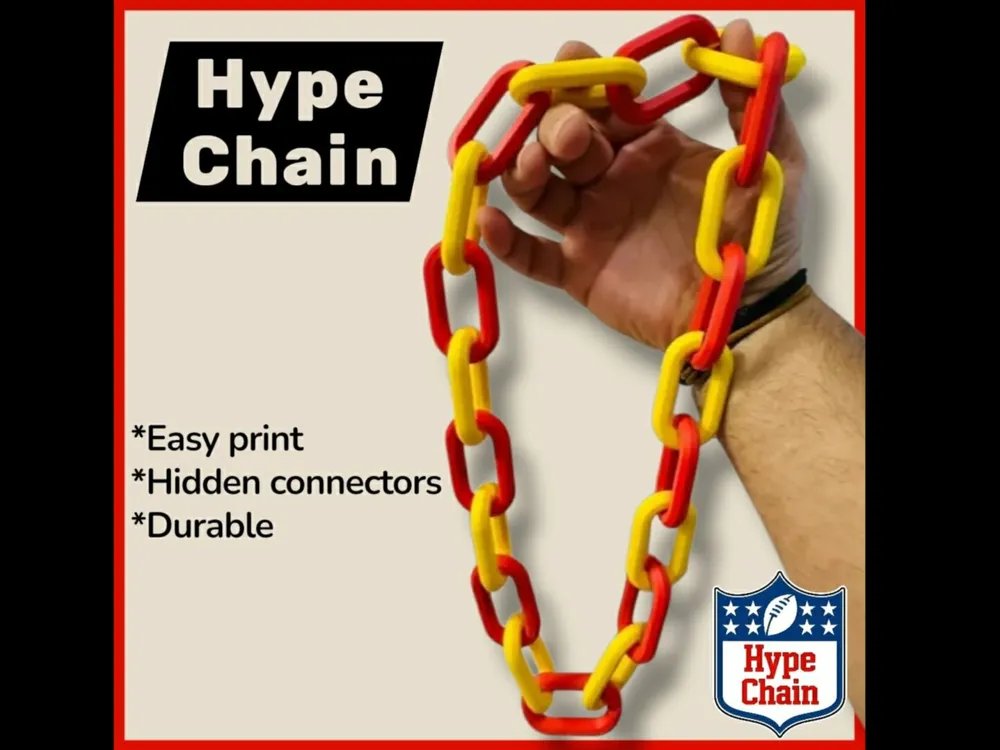 Red and gold 3D-printed fan hype chain with interlocking links held up in a hand