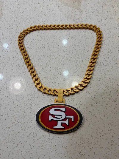 Gold 3D-printed fan chain necklace with a red and white football team logo pendant